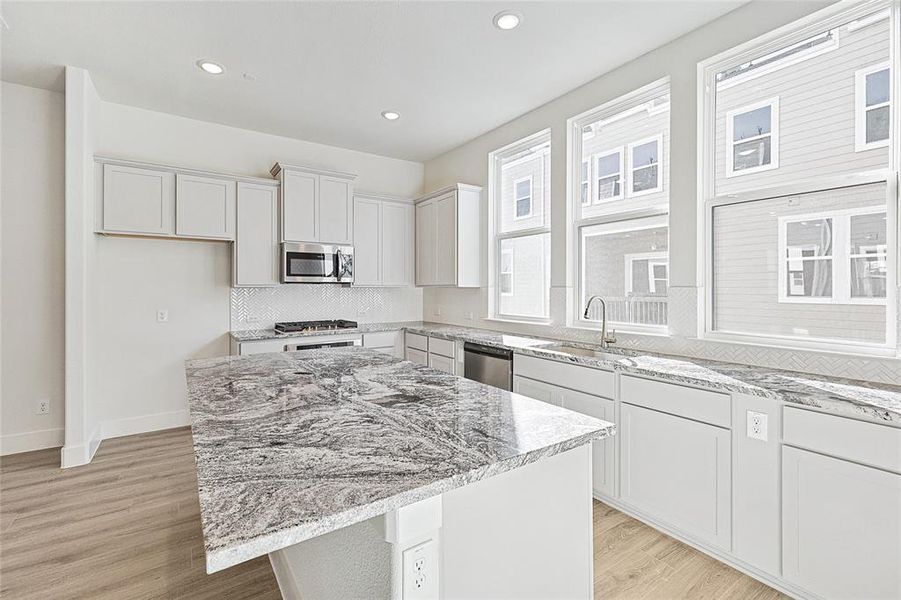 Furnished interior view inside a new home in Collin Creek, Plano (Image 13).