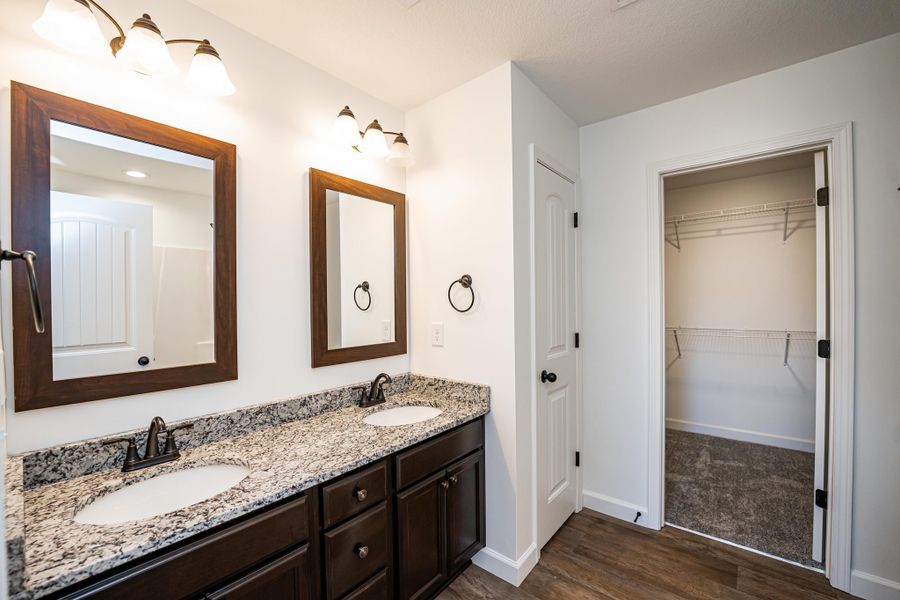 Representative furnished interior of a home built from the Sumter by Enchanted Homes in Lonesome Dove, San Antonio (Image 10).