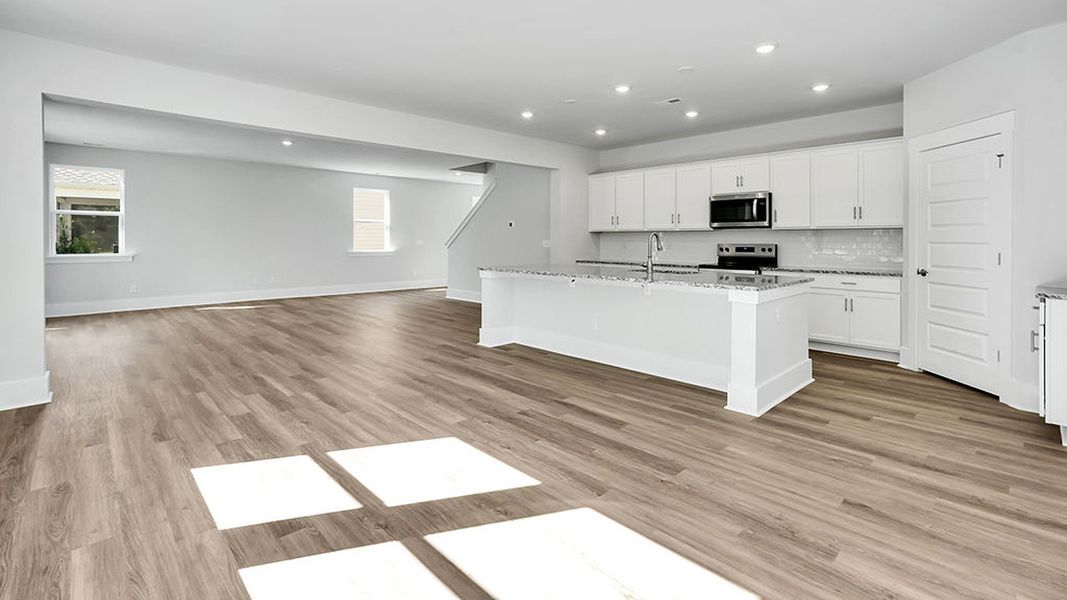 Spacious, unfurnished interior of a new home in The Haven at Indigo Preserve, Leland (Image 20).