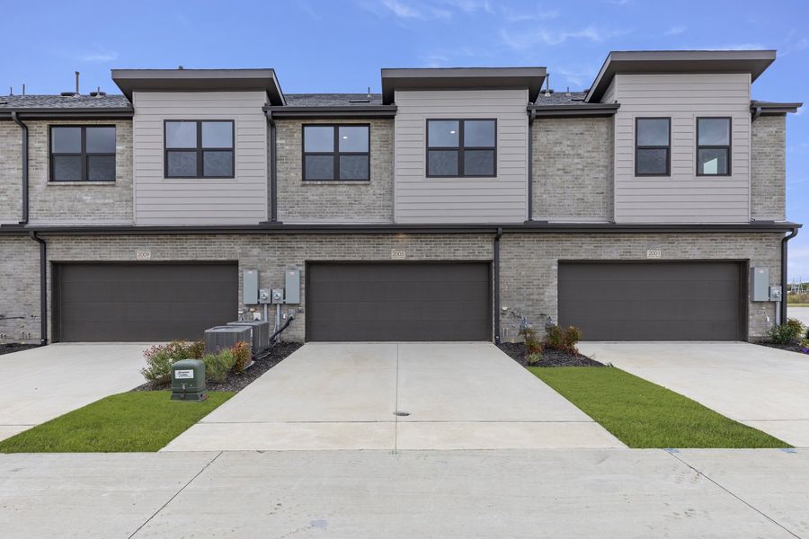 Front exterior of a new home in Ten Mile Creek, Celina, TX, highlighting curb appeal (Image 23).