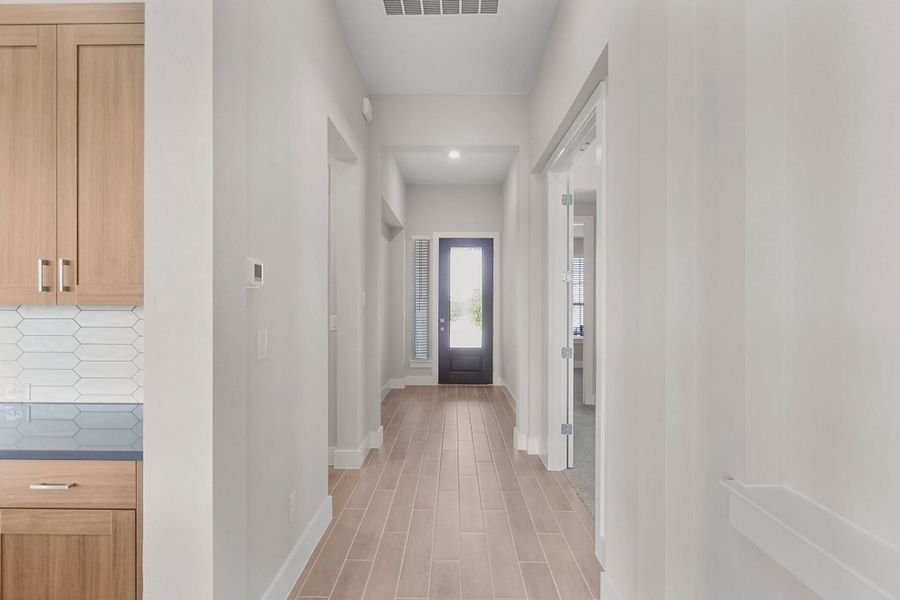 Spacious, unfurnished interior of a new home in Parkside on the River, Georgetown (Image 6).