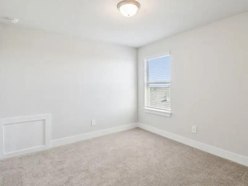 Spacious, unfurnished interior of a new home in Legendary Trails - Premier Series, Cibolo (Image 24).