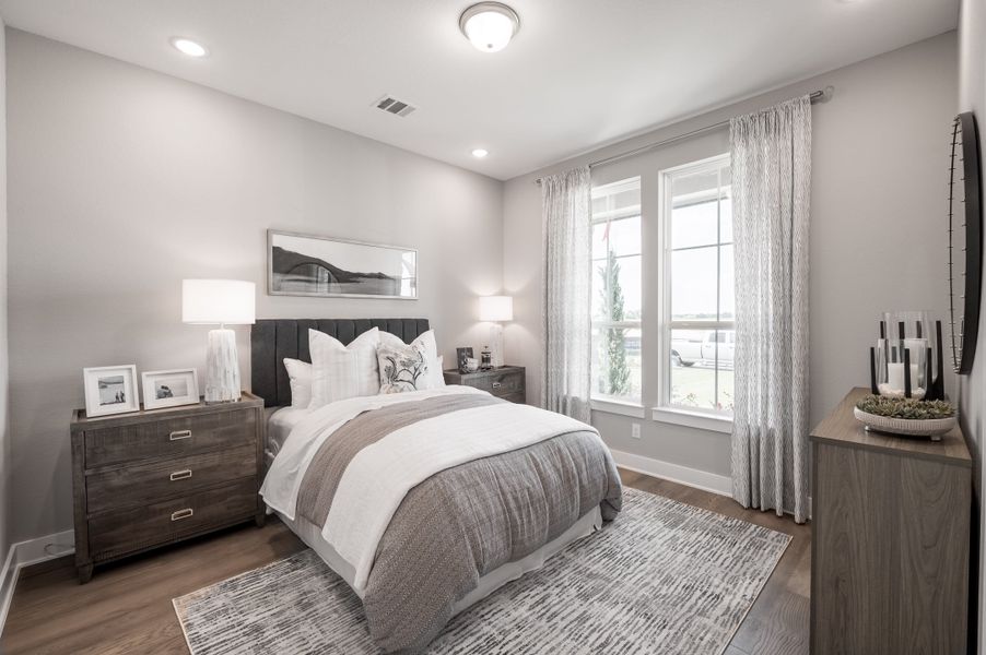 Representative furnished interior of a home built from the Barnhart by Tri Pointe Homes in Dunham Pointe, Cypress (Image 42).