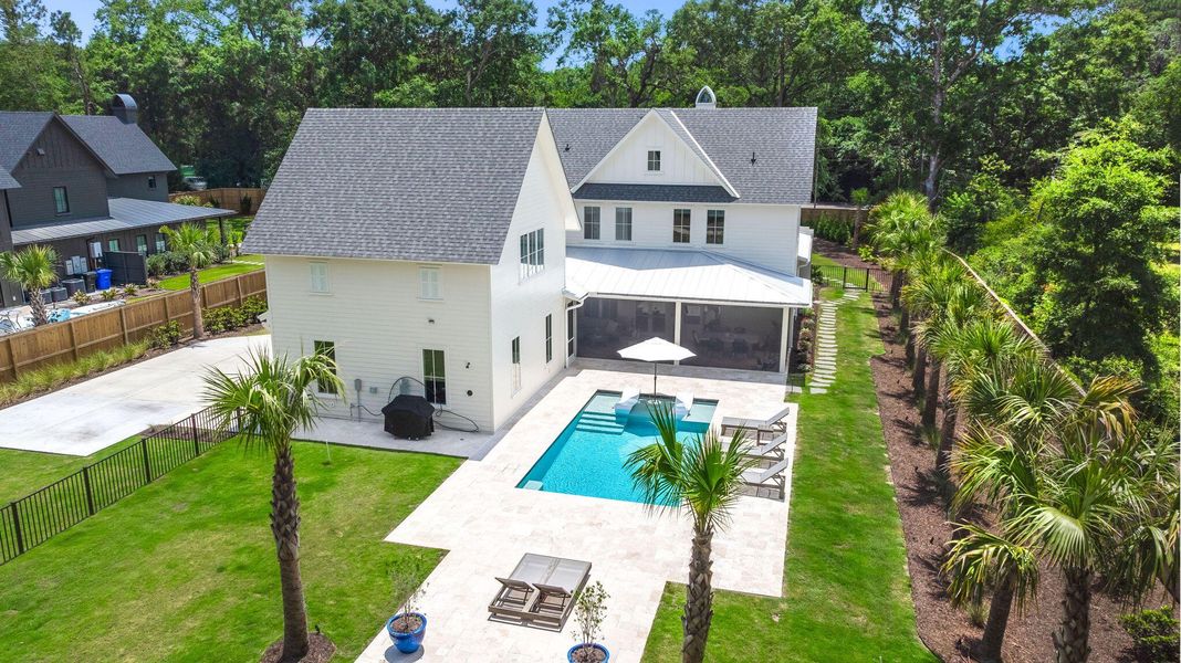 Exterior details and patio area of a home in , Johns Island (Image 38).
