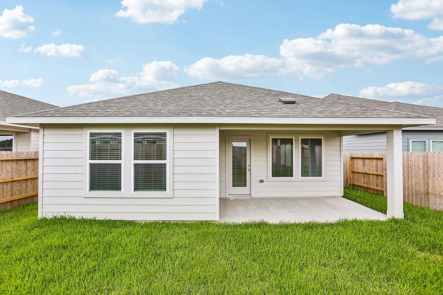 Exterior details and patio area of a home in Riviera Pines - Traditional Series, Conroe (Image 3).