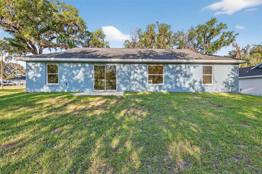 Exterior details and patio area of a home in , Summerfield (Image 14).