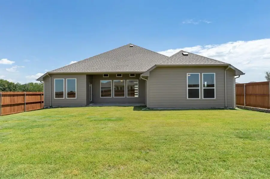 Exterior details and patio area of a home in Heartland, Heartland (Image 3).