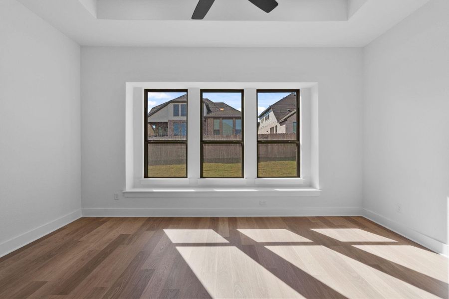 Primary Bedroom with tray ceiling