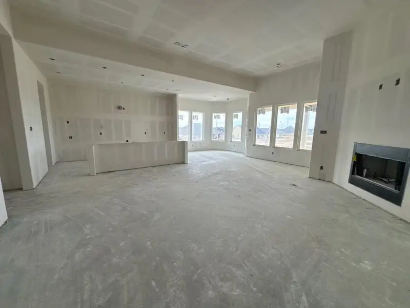 Unfurnished living room featuring a fireplace Unfurnished living room featuring a fireplace