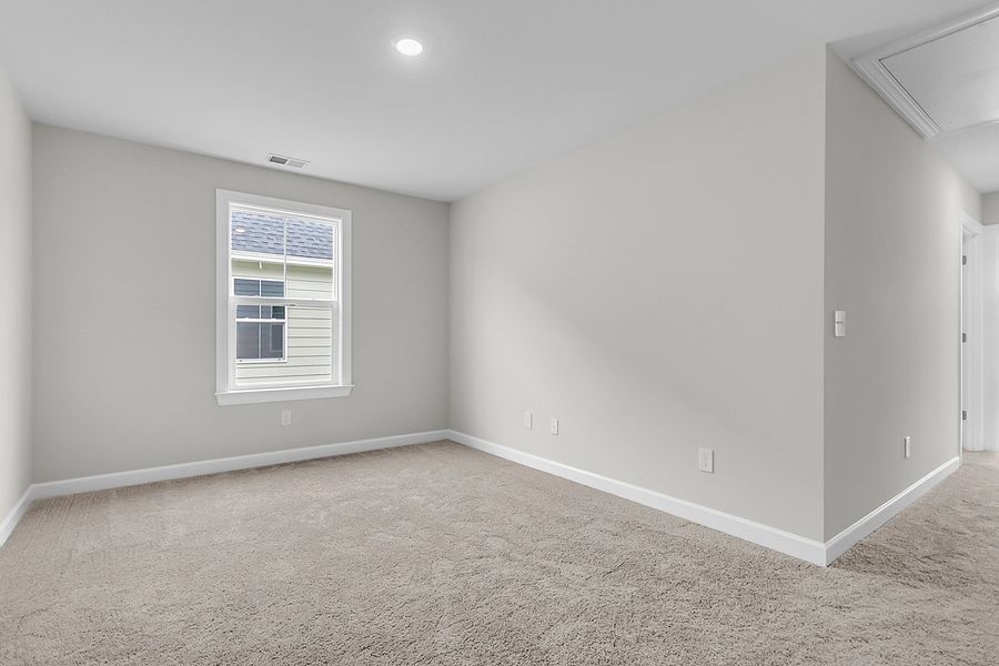 Spacious, unfurnished interior of a new home in Pineland Preserve, Summerville (Image 38).