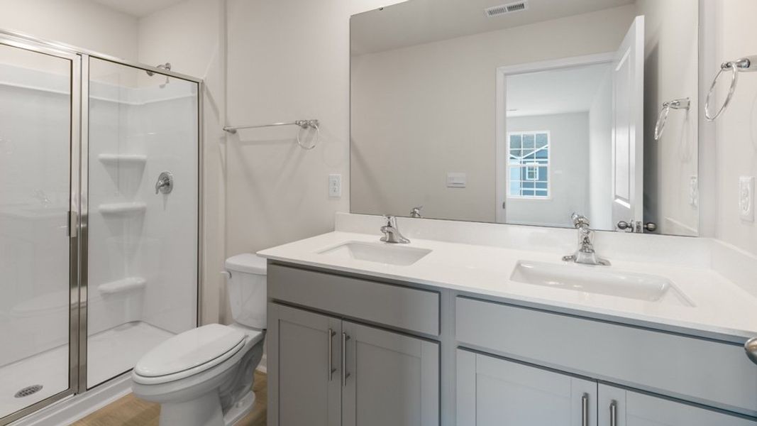 Furnished interior view inside a new home in Clock Road Townhomes, New Bern (Image 6).