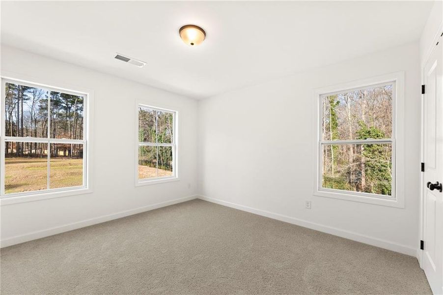 Spacious, unfurnished interior of a new home in Bluffs at Bells Ferry, Marietta (Image 20).