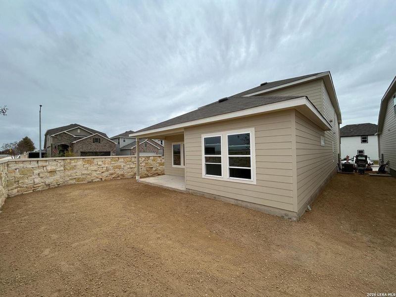 Exterior details and patio area of a home in Meadows at Hennersby Hollow 40's, San Antonio (Image 19). Exterior details and patio area of a home in Meadows at Hennersby Hollow 40's, San Antonio (Image 19).