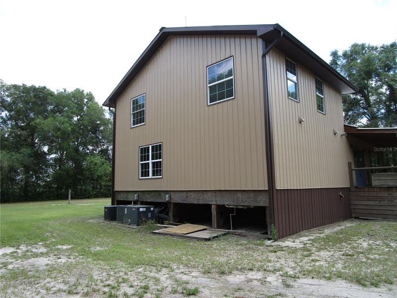 Exterior details and patio area of a home in , Dade City (Image 13).