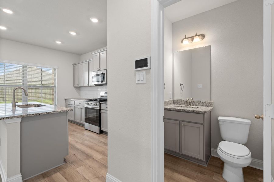 Furnished interior view inside a new home in Sunterra, Katy (Image 8).