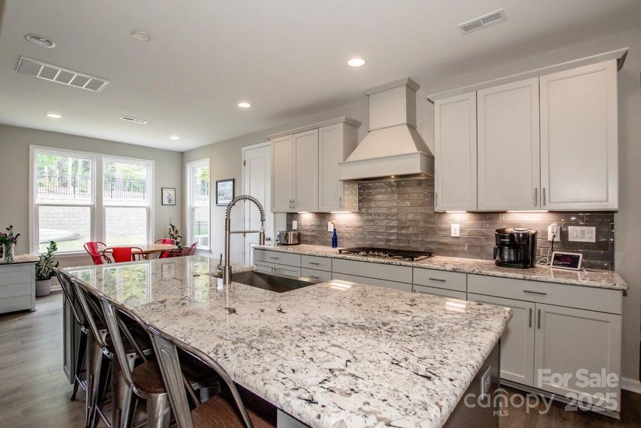 Furnished interior view inside a new home in Signature at Reid's Cove, Mooresville (Image 23).