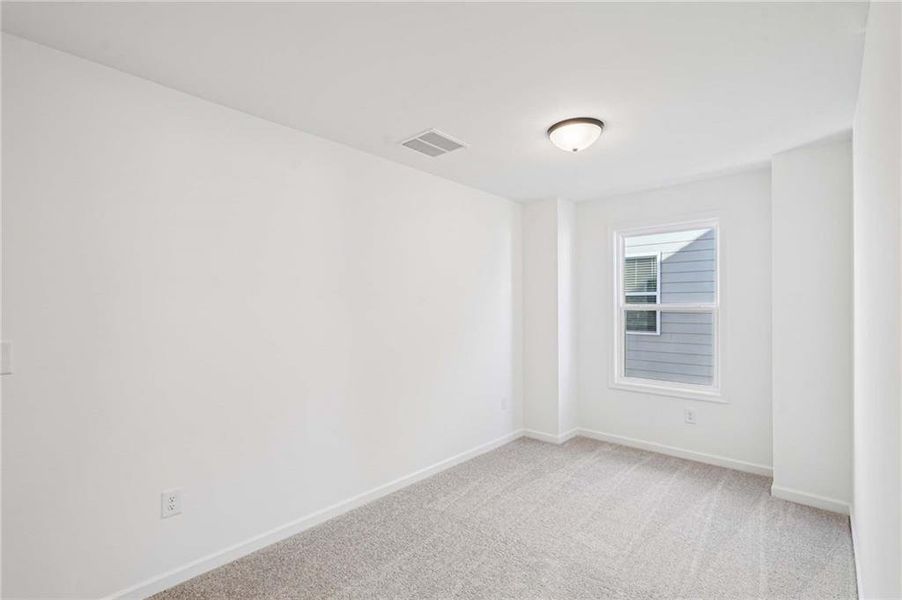 Spacious, unfurnished interior of a new home in Eastlyn Crossing - Single Family, Flowery Branch (Image 33). Spacious, unfurnished interior of a new home in Eastlyn Crossing - Single Family, Flowery Branch (Image 33).