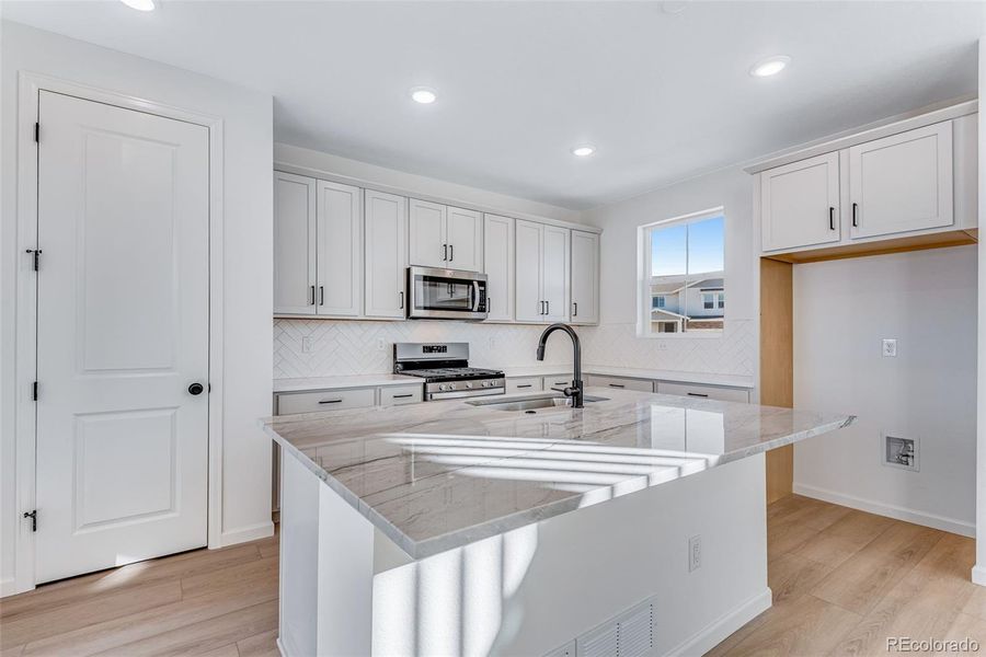 Furnished interior view inside a new home in Painted Prairie, Aurora (Image 11). Furnished interior view inside a new home in Painted Prairie, Aurora (Image 11).