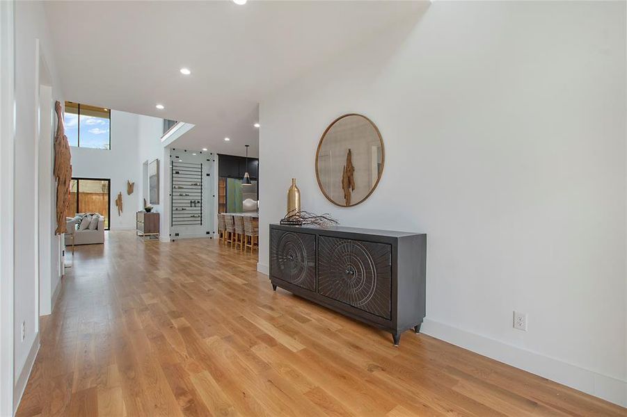 Hall featuring light hardwood / wood-style floors