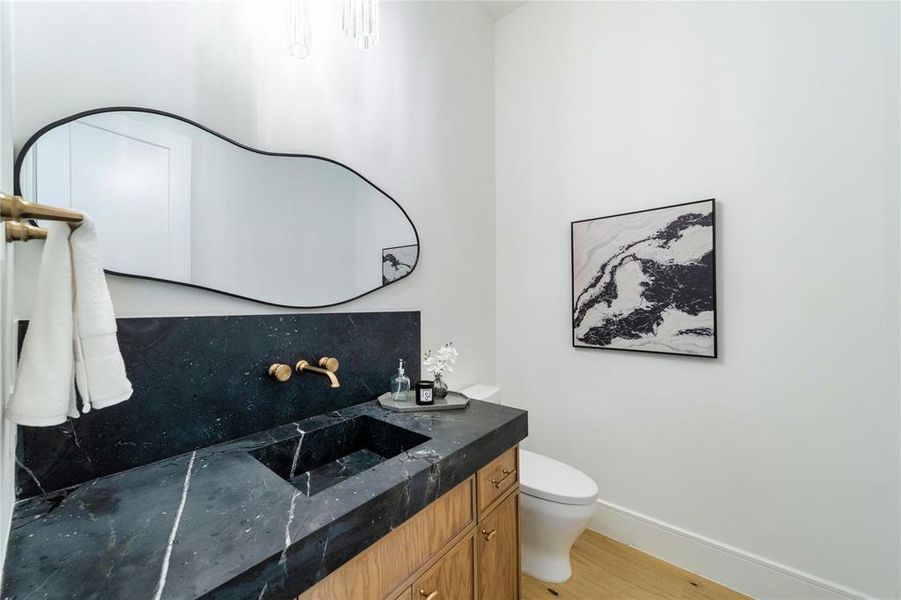 Bathroom with vanity and light wood-type flooring