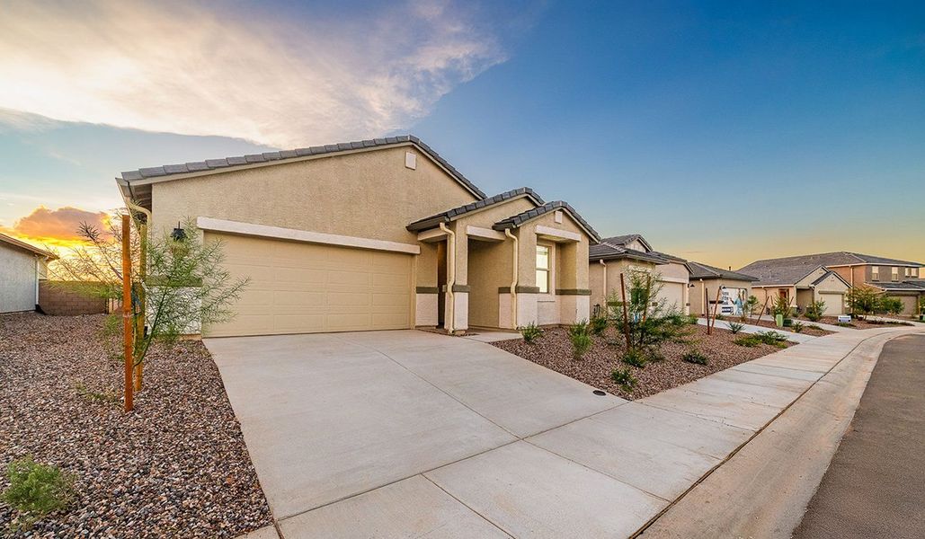 Front exterior of a new home in Saguaro Bloom, Marana, AZ, highlighting curb appeal (Image 17).