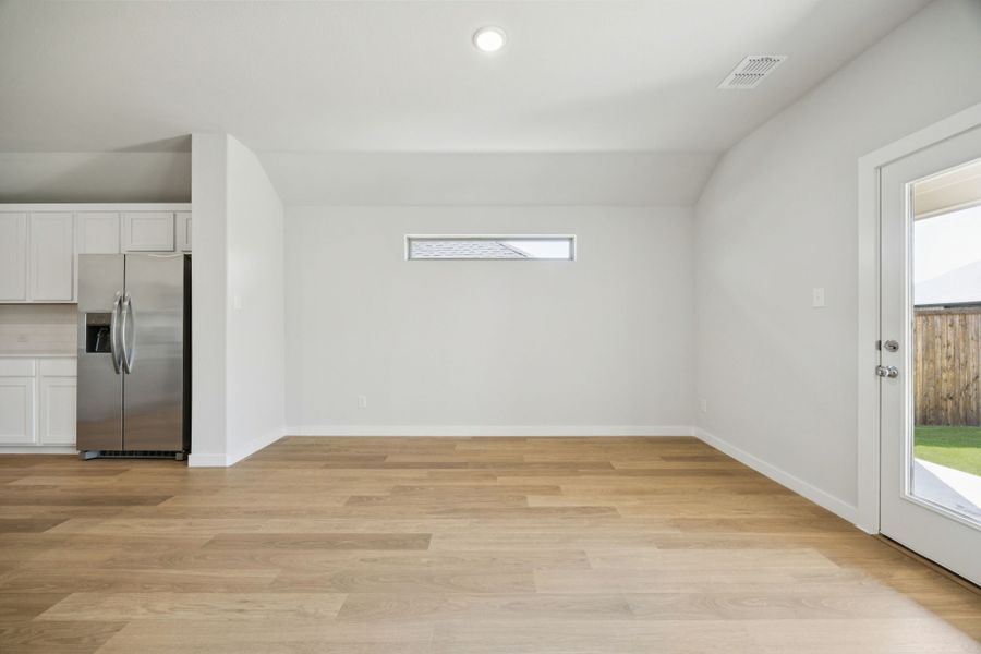 Dining Room in the Heisman home plan by Trophy Signature Homes – REPRESENTATIVE PHOTO Dining Room in the Heisman home plan by Trophy Signature Homes – REPRESENTATIVE PHOTO