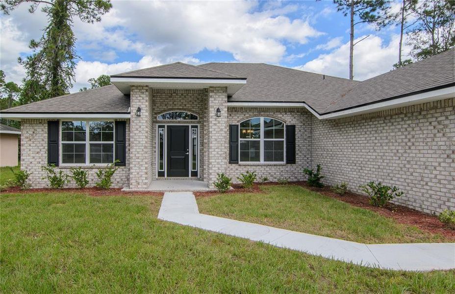 Exterior details and patio area of a home in , Palm Coast (Image 27).