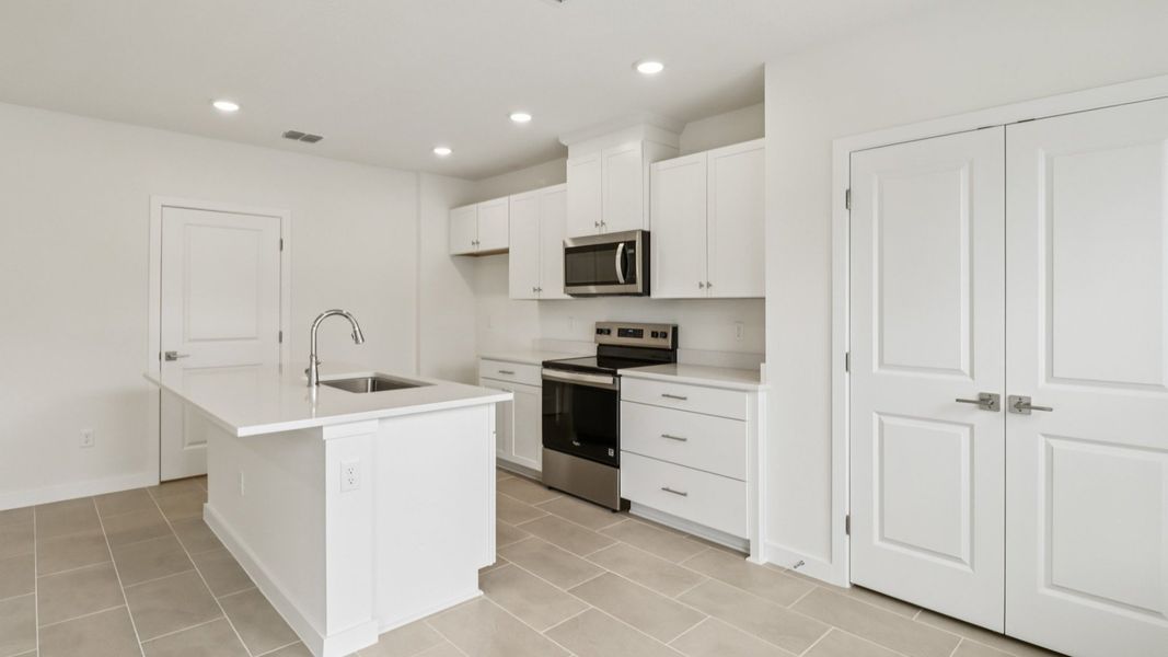 Representative furnished interior of a home built from the Carmel - Interior by DRB Homes in Cyrene at Harmony, St. Cloud (Image 12). Representative furnished interior of a home built from the Carmel - Interior by DRB Homes in Cyrene at Harmony, St. Cloud (Image 12).