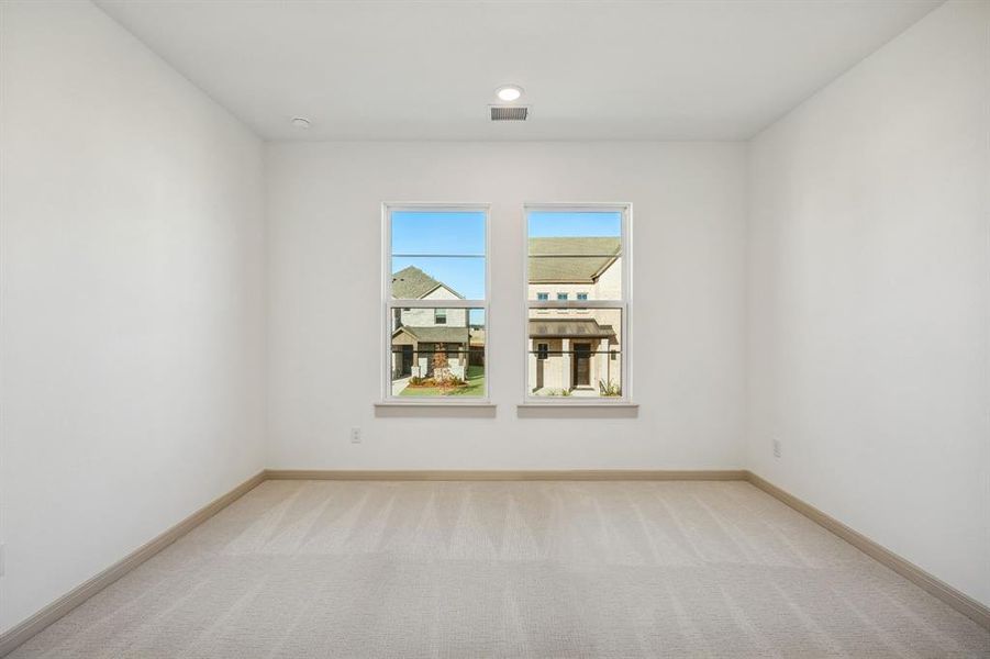 You'll find nicely sized secondary bedrooms in our Corsica plan.