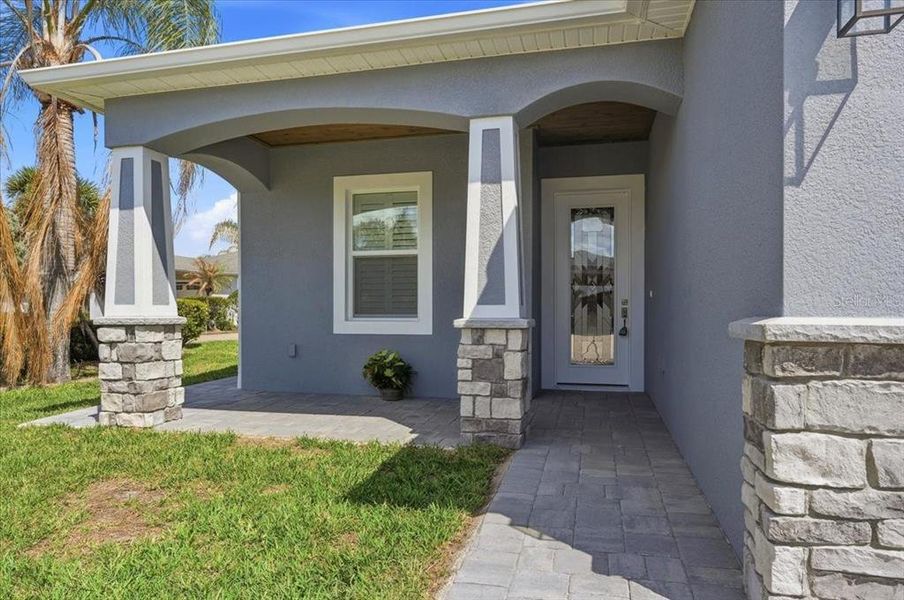 Exterior details and patio area of a home in , Polk City (Image 31).