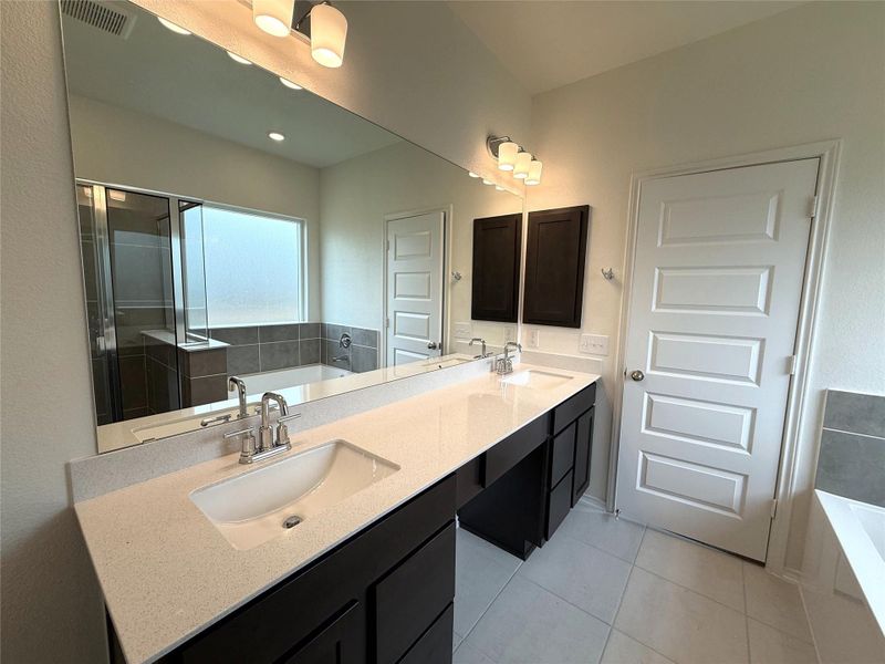 Furnished interior view inside a new home in River Bluff, Leander (Image 9). Furnished interior view inside a new home in River Bluff, Leander (Image 9).