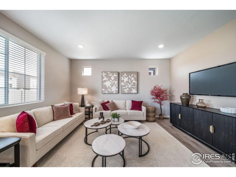 Furnished interior view inside a new home in Thompson River Ranch, Johnstown (Image 1).