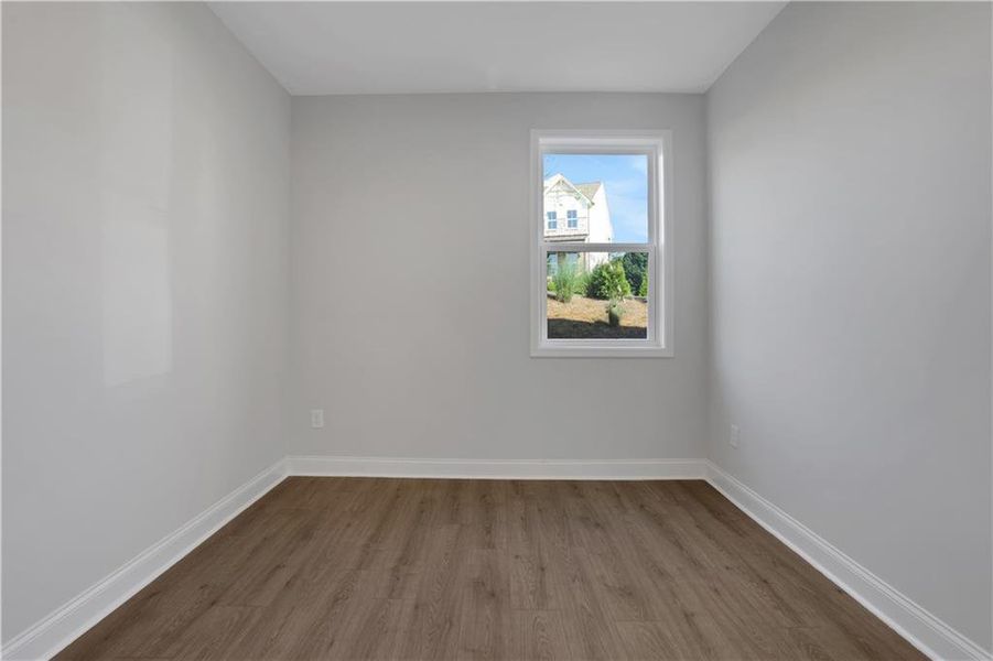 Spacious, unfurnished interior of a new home in The Paddocks at Doc Hughes, Buford (Image 20).