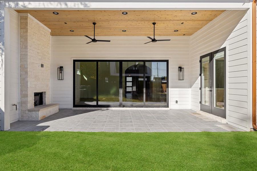 Covered back patio with fireplace Covered back patio with fireplace