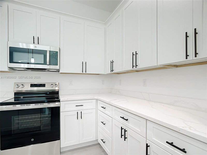 Furnished interior view inside a new home in , Port Charlotte (Image 15).