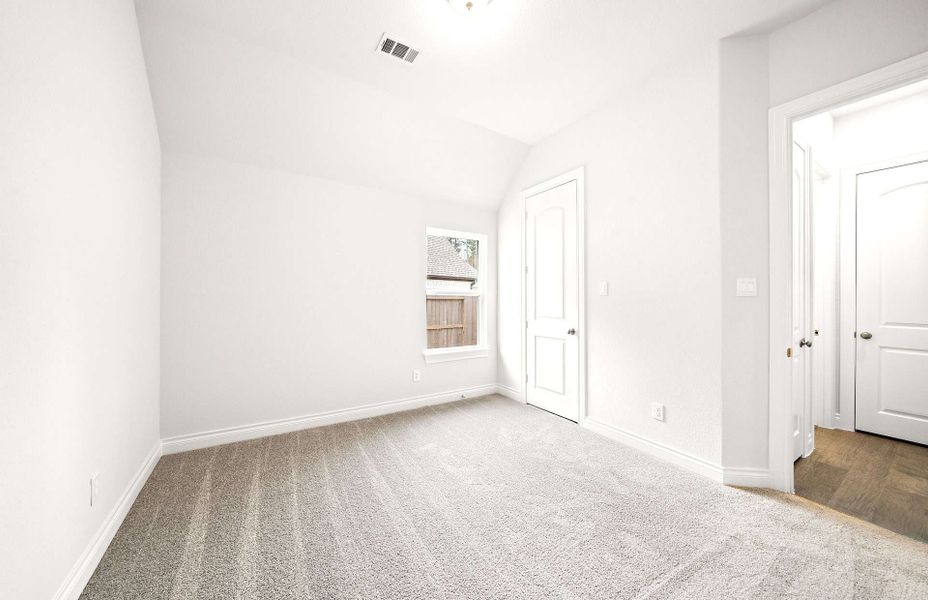 Representative unfurnished interior of a home built from the 2406 by Ravenna Homes in The Highlands 55′, Porter (Image 38).