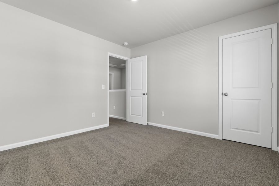 Representative unfurnished interior of a home built from the Poplar A by McGuinn Homes in Rivers Crossing, Aiken (Image 45). Representative unfurnished interior of a home built from the Poplar A by McGuinn Homes in Rivers Crossing, Aiken (Image 45).
