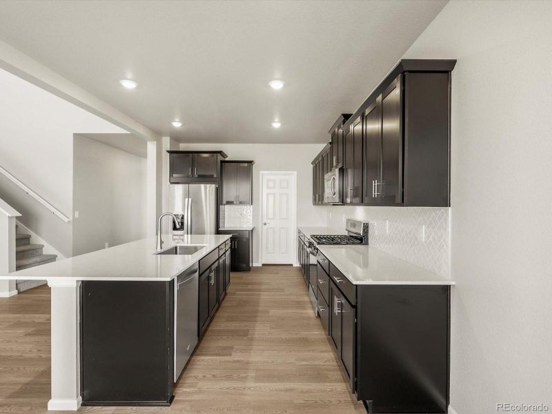 Furnished interior view inside a new home in Poudre Heights: The Alpine Collection, Windsor (Image 14). Furnished interior view inside a new home in Poudre Heights: The Alpine Collection, Windsor (Image 14).