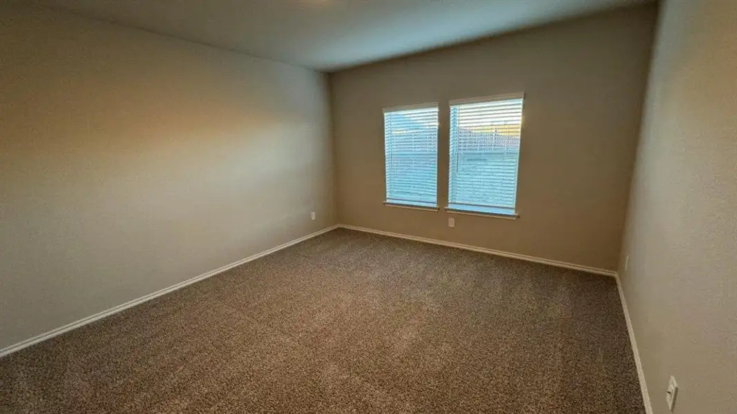 Spacious, unfurnished interior of a new home in Monarch at the Meadows, Ponder (Image 10).