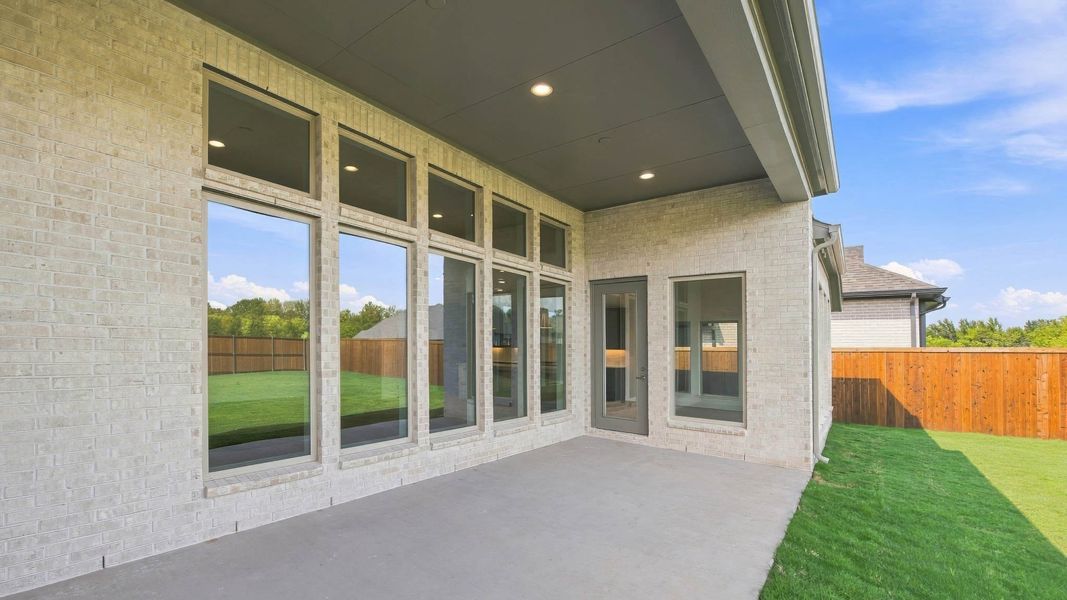 Exterior details and patio area of a home in Sonoma Verde, McLendon-Chisholm (Image 3).