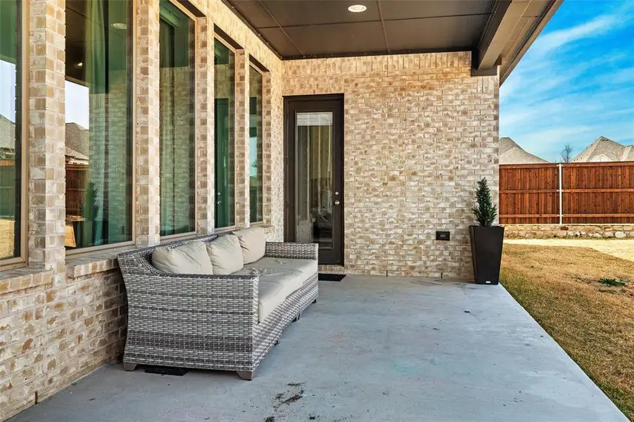 Exterior details and patio area of a home in Walsh, Fort Worth (Image 3).