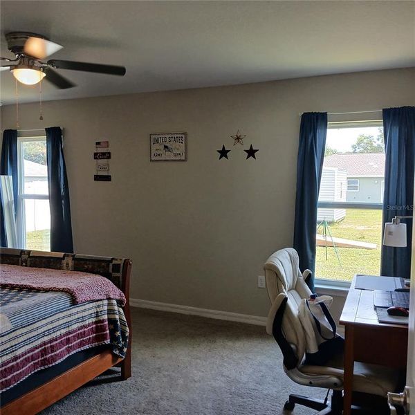 Furnished interior view inside a new home in , Dunnellon (Image 7).