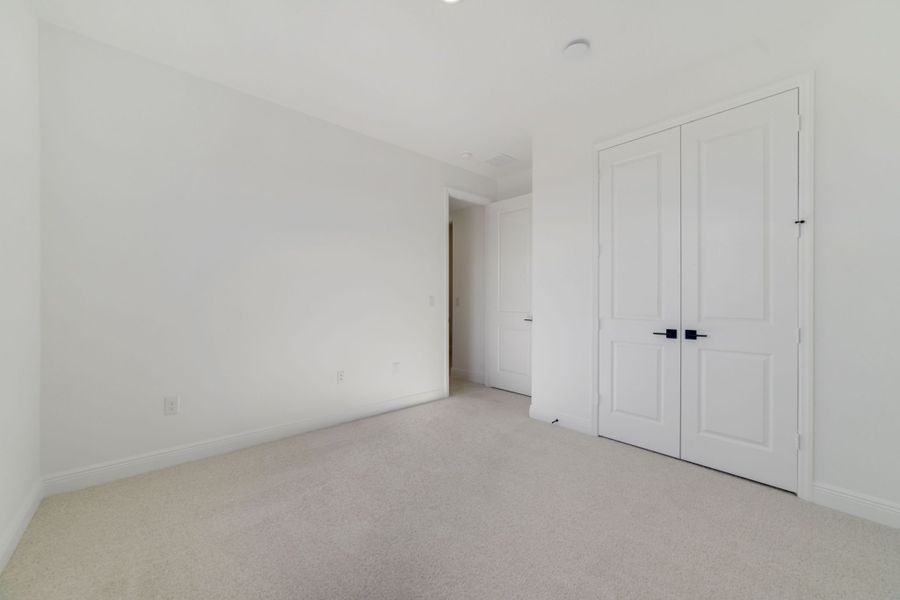 Spacious, unfurnished interior of a new home in Vintner Reserve, Clermont (Image 18). Spacious, unfurnished interior of a new home in Vintner Reserve, Clermont (Image 18).