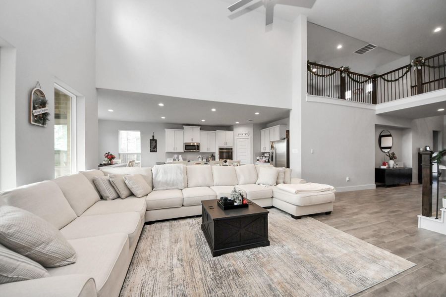 Furnished interior view inside a new home in , Conroe (Image 6).