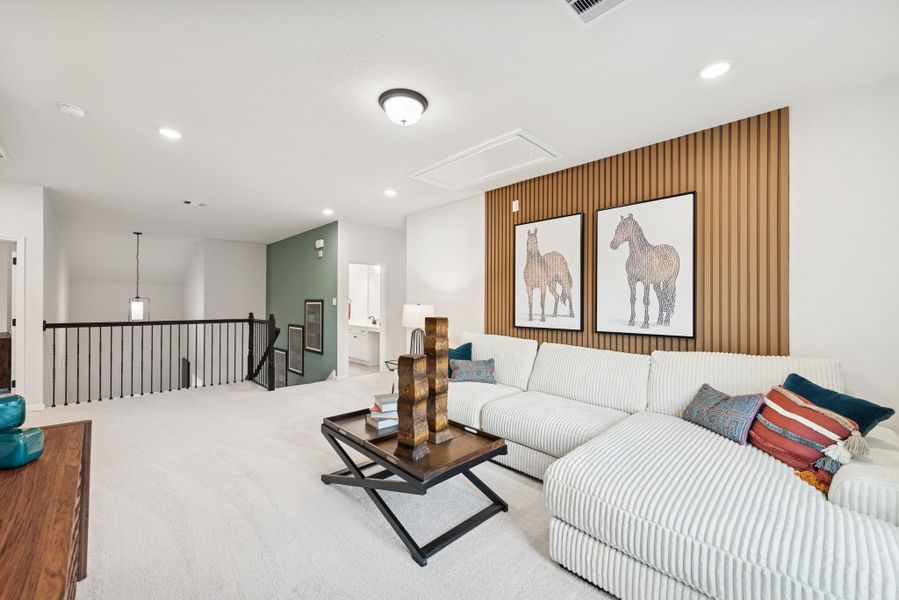 The Princeton II- Loft/Upstairs Game Room. Staged model home shown for illustration only; actual features, colors, and upgrades may vary.