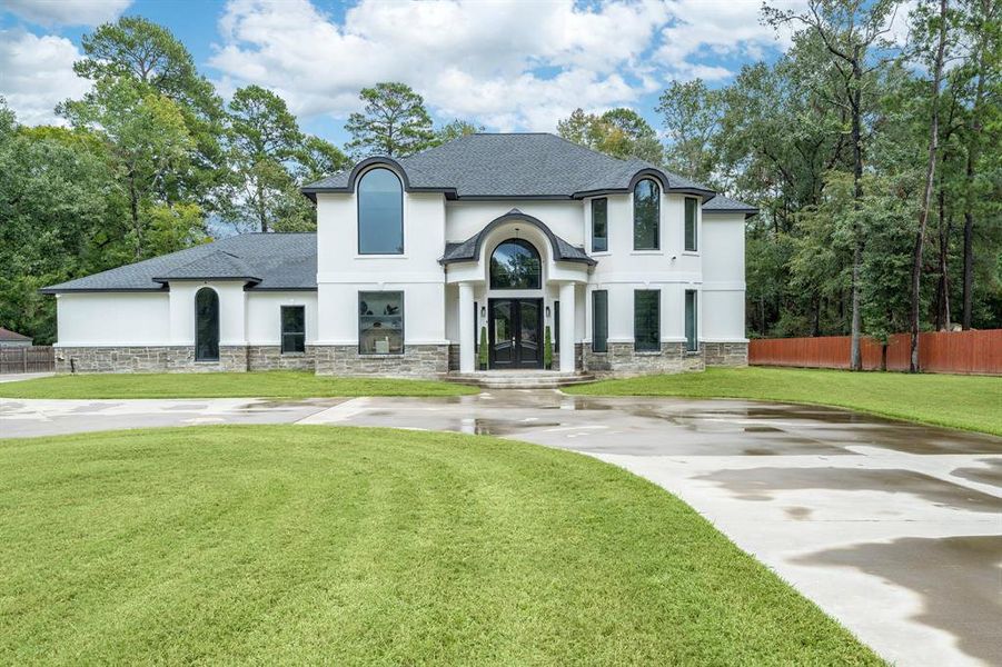 Welcome to 15475 Conroe Drive with an Impressive Circular Driveway Entrances