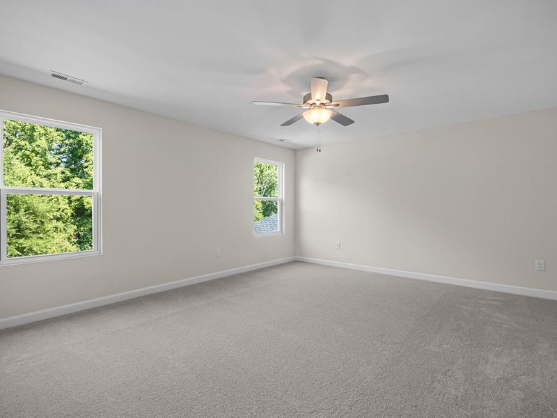 Spacious, unfurnished interior of a new home in Woodland Crossing, Zebulon (Image 12).