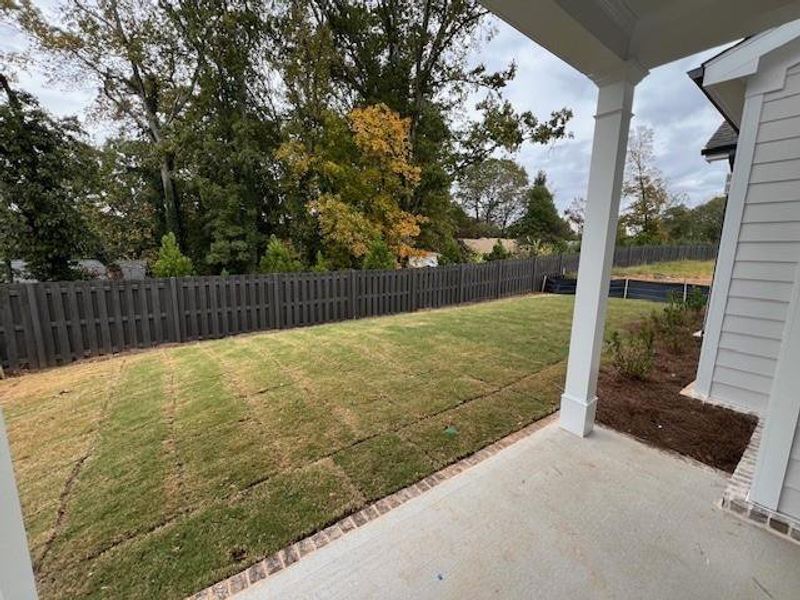 Exterior details and patio area of a home in Promenade at Sawnee Village, Cumming (Image 24). Exterior details and patio area of a home in Promenade at Sawnee Village, Cumming (Image 24).