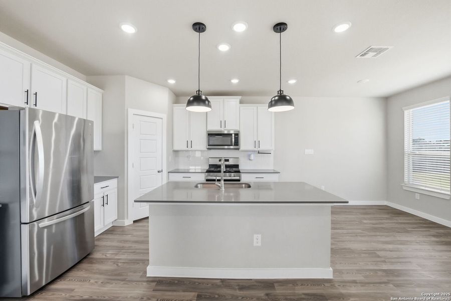 Furnished interior view inside a new home in Morgan Meadows, San Antonio (Image 8).