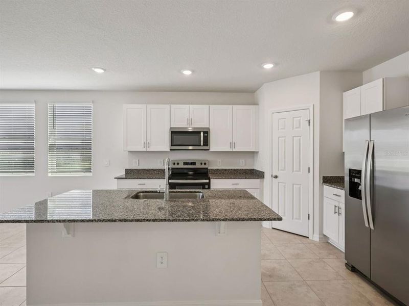 Furnished interior view inside a new home in , Winter Haven (Image 4). Furnished interior view inside a new home in , Winter Haven (Image 4).